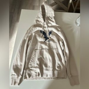 small cream american eagle graphic hoodie